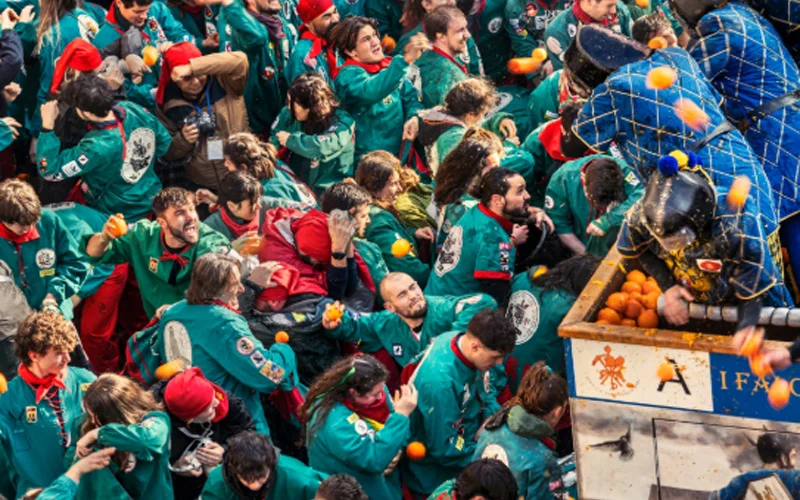 The Battle of the Oranges is an annual tradition in Ivrea, Italy, and part of a larger celebration described by its organizers as “the most ancient historical Carnival in Italy.” The Tuchini team tosses oranges in the Borghetto, one of the oldest and most fascinating parts of town.