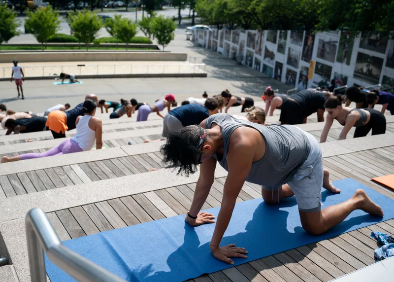 People doing outdoor yoga
