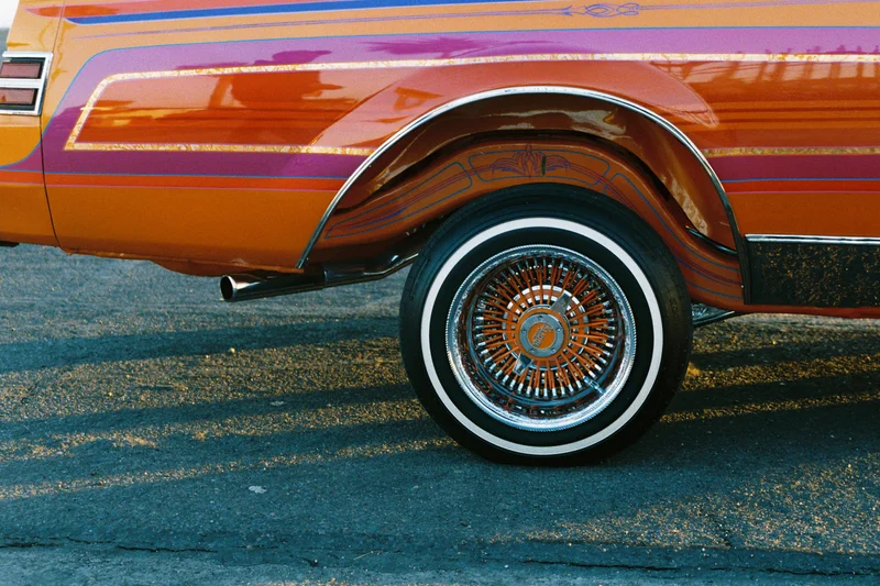 Close up image of red vintage car.