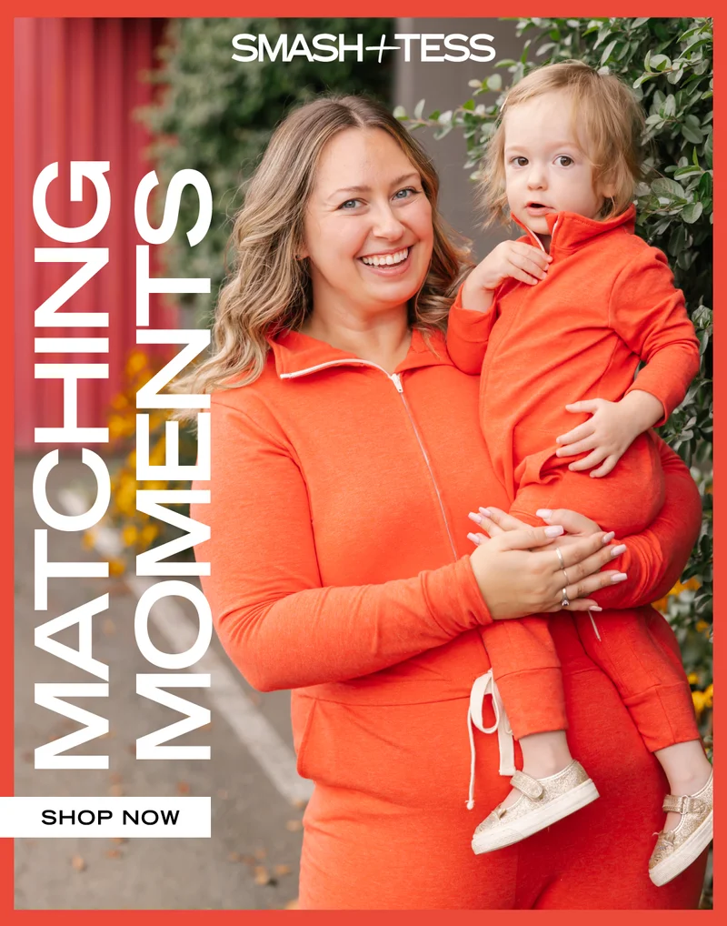 mom and toddler wearing red smash + tess jumpsuit with 'matching moments' text over top