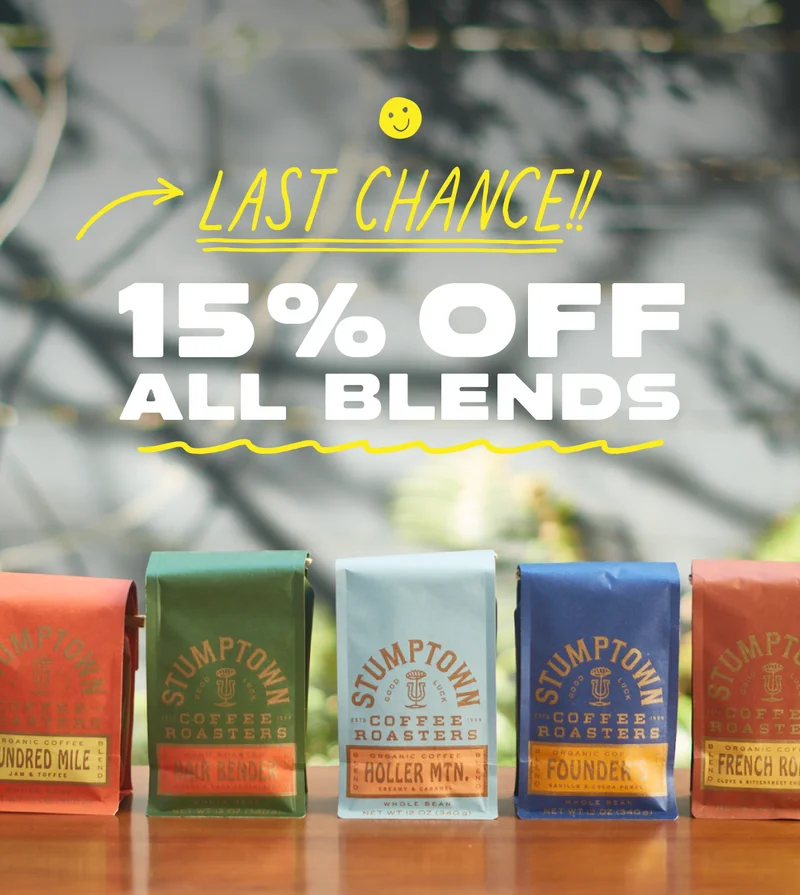 Photo of Stumptown coffee blend bags with the ocean in the background. Caption: Last Chance!! 15% Off All Blends