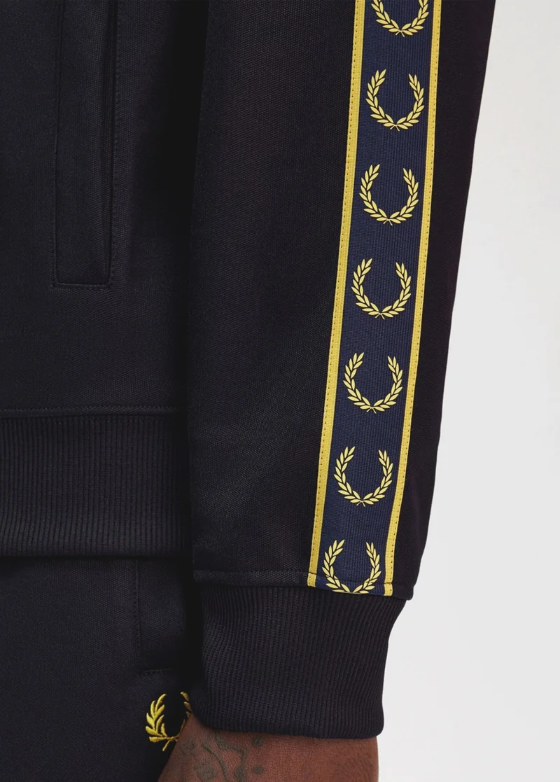 Navy and gold taping on our classic track jacket