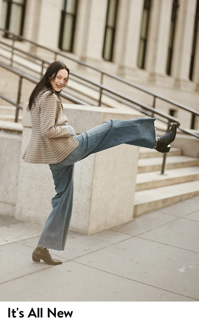 A woman models jeans from rag & bone.