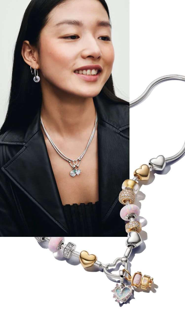 Model wearing friendship charms on earrings and necklace