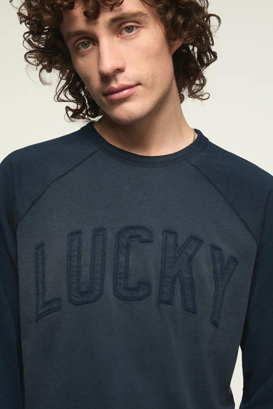 Image of Lucky Brand Lucky Applique Baseball Tee - Men's Clothing Tops Shirts Tee Graphic T Shirts in Indigo
