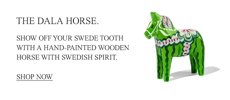 HE DALA HORSE. SHOW OFF YOUR SWEDE TOOTH WITH A HAND-PAINTED WOODEN HORSE WITH SWEDISH SPIRIT.  [SHOP NOW]