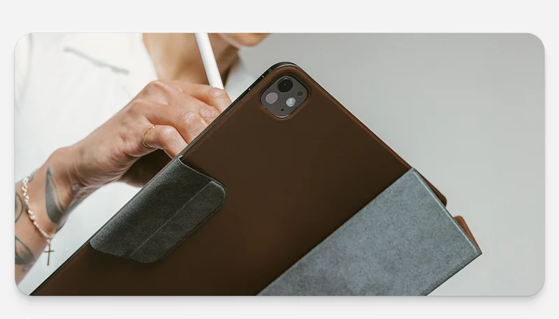 Leather Folio Plus for iPad M4. In brown, showcasing the camera cutout and Apple Pencil compatibility.