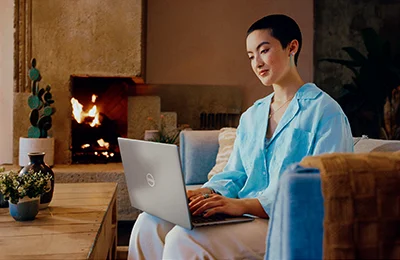 Gen AI Qualcomm Launch - Woman Working in Hotel Lobby