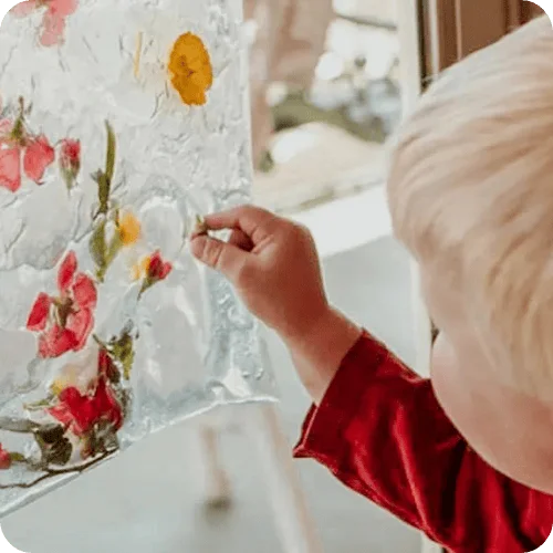 a toddler playing with a spring-themed sensory bag a toddler playing with a spring-themed sensory bag