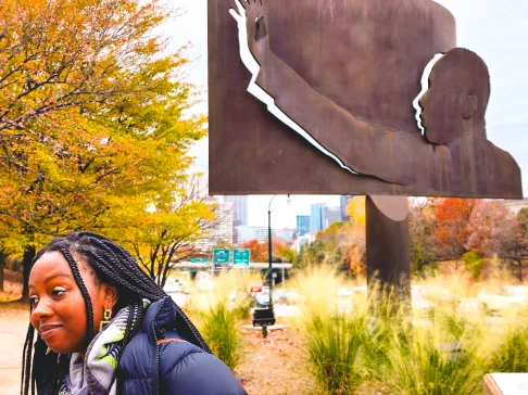 Image Description: A person near a monument.