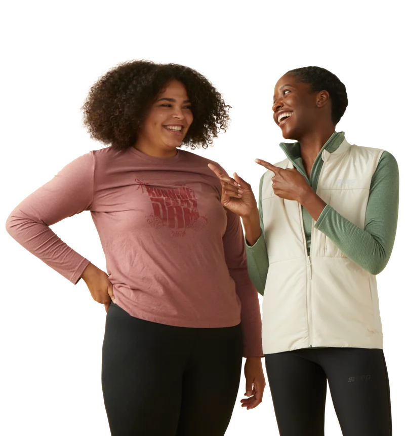 two woman smiling