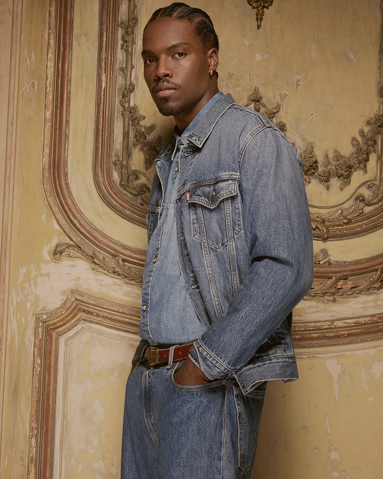 Gif of a person wearing medium wash denim on denim