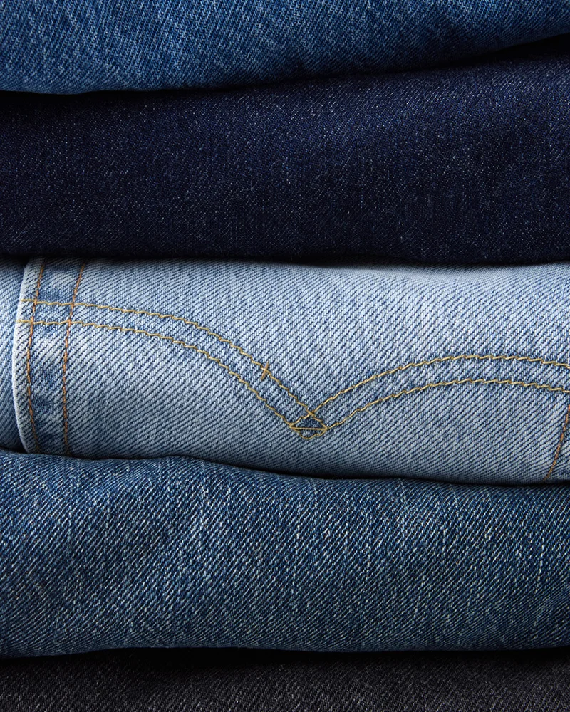 Stack of jeans in different washes
