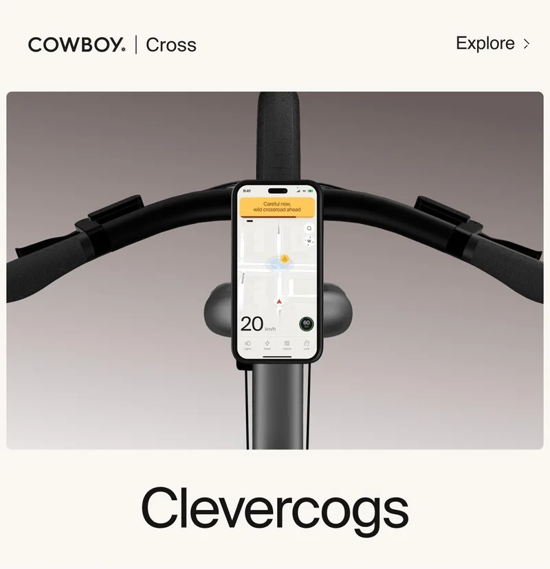 A photograph render showing a phone docked on the Cross cockpit with the Cowboy app open