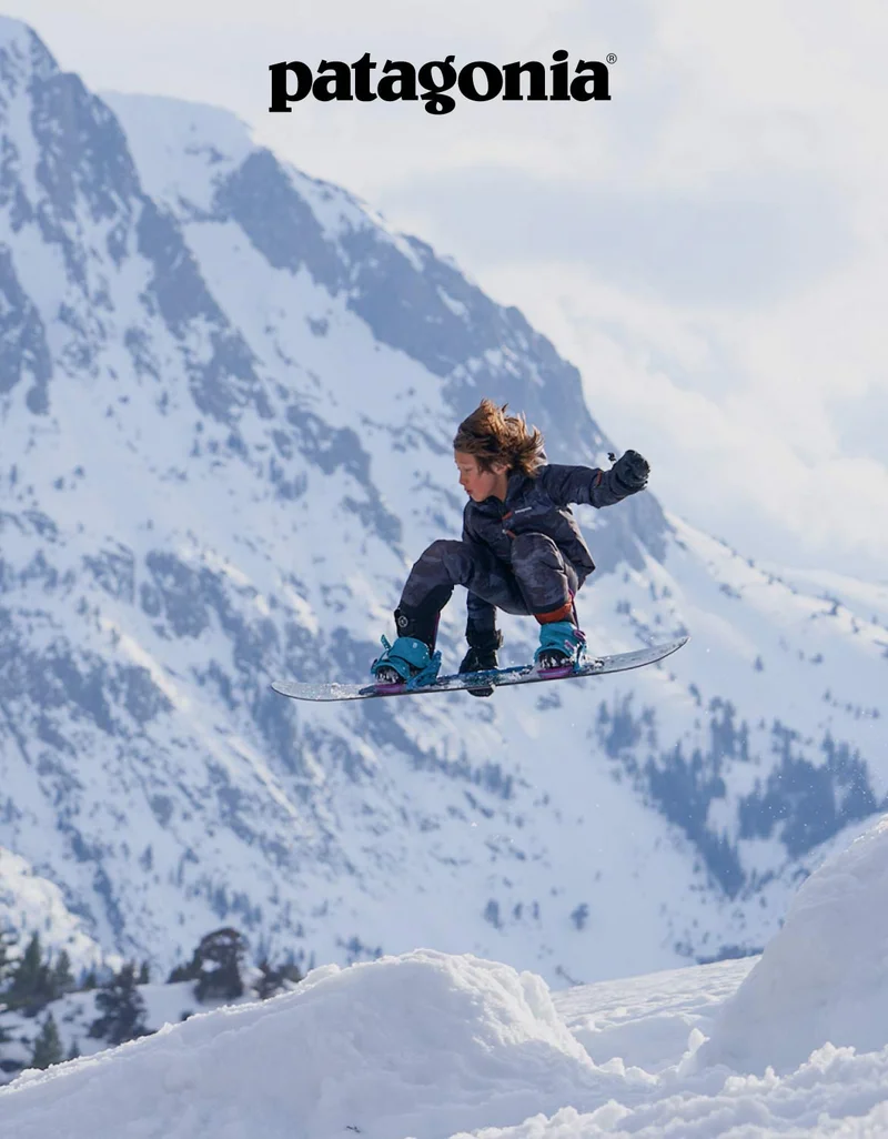 Patagonia. A child catches air on their snowboard.