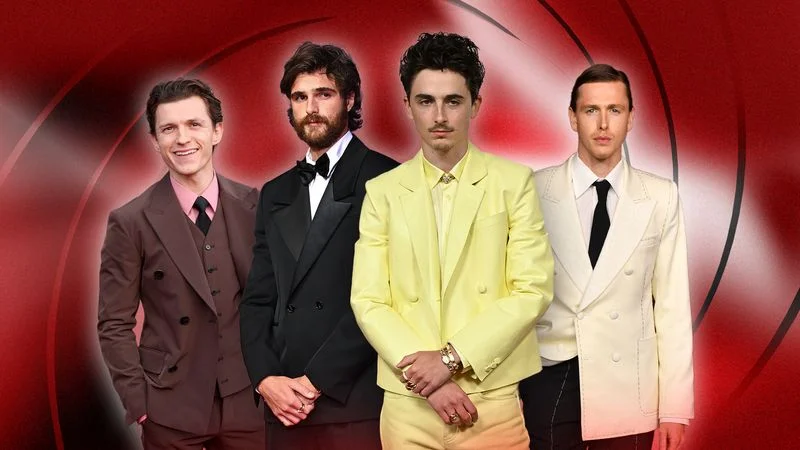 Image may contain: Timothée Chalamet, Tom Holland, Harris Dickinson, Clothing, Coat, Blazer, Jacket, and Accessories