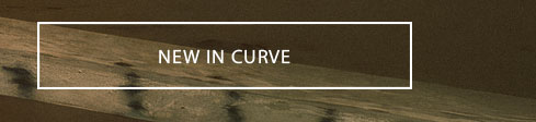 White "NEW IN CURVE" text in a minimalist rectangle on a textured dark olive-brown background, promoting new arrivals for the curve collection.