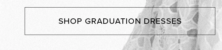 White call-to-action button with black text 'SHOP GRADUATION DRESSES' against a soft grey textured background. Browse elegant dresses for your ceremony.