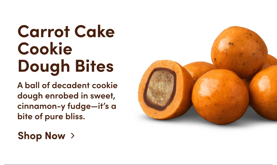 Carrot Cake Cookie Dough Bites | A ball of decadent cookie dough enrobed in sweet, cinnamon-y fudge-it's a bite of pure bliss; Shop Now