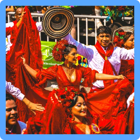 Image description: Festive dancers in a parade