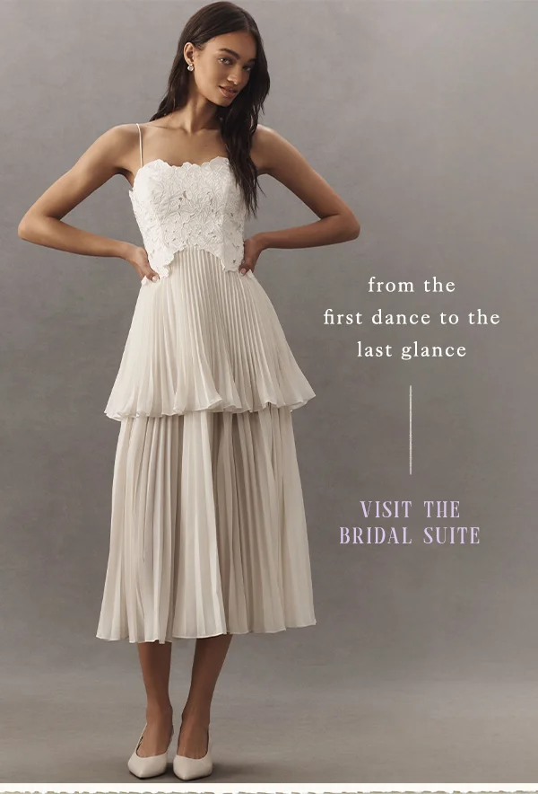 Tiered pleated gown. Visit the bridal suite.