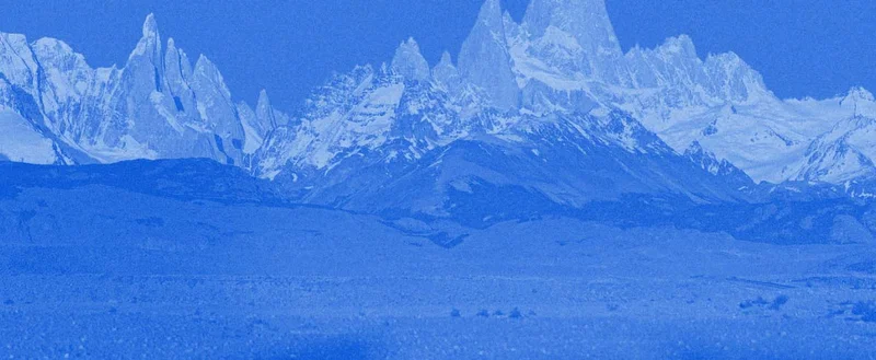 Stylized view of rugged mountains.