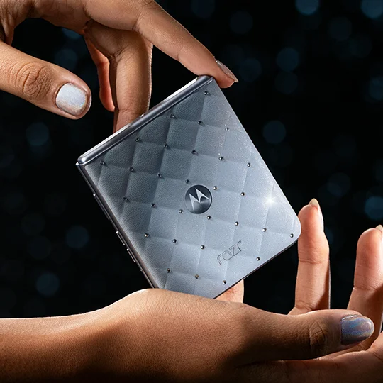 The new motorola razr Swarovski® edition held in hands