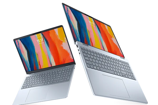 Two Dell 16 Plus laptop computers floating in midair.