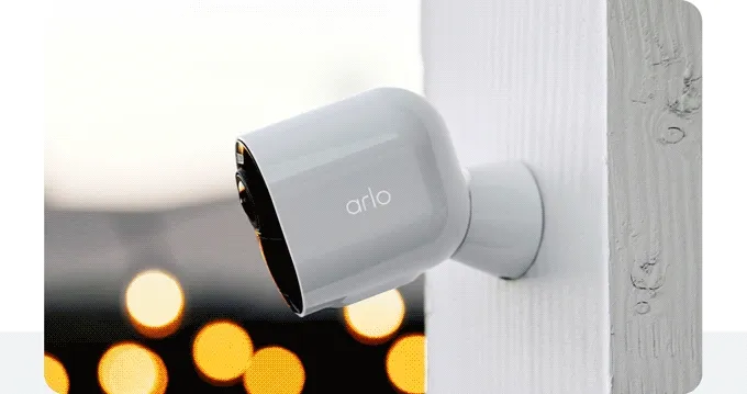 Slideshow featuring various Arlo security products in use.