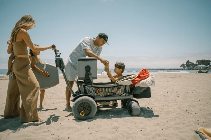 family using veer day cooler on the beach