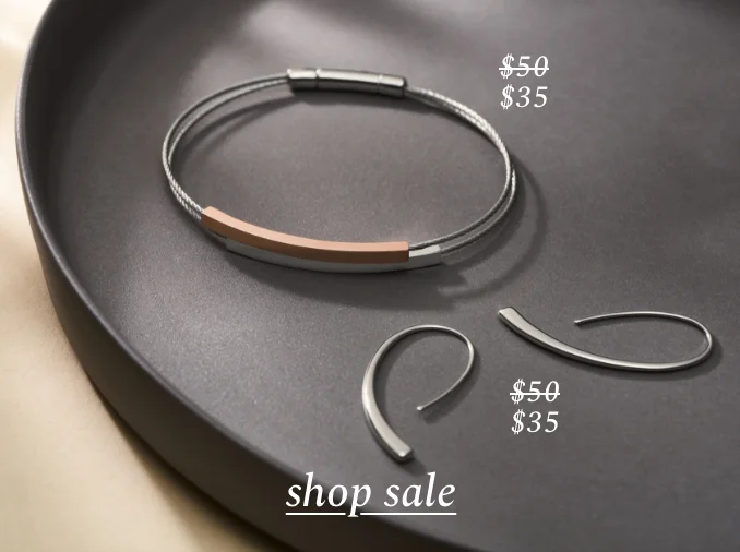 Shop sale for jewelry. Bracelet was $60. Now $35. Earrings were $50. Now $35.
