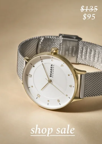 Shop sale for women's gold and silver watch. Was $135. Now $95.