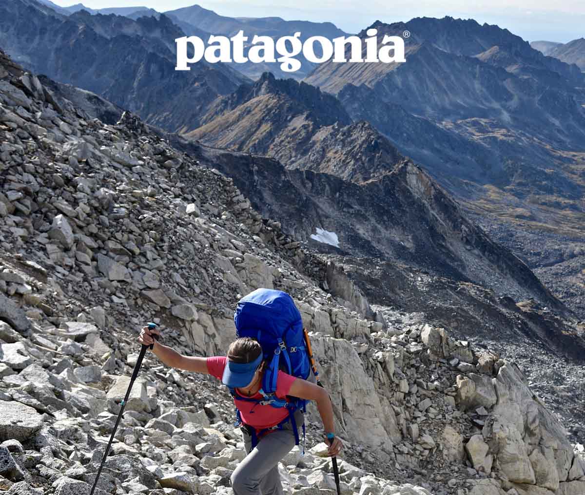 Patagonia. A hiker using trekking poles ascends a talus slope.