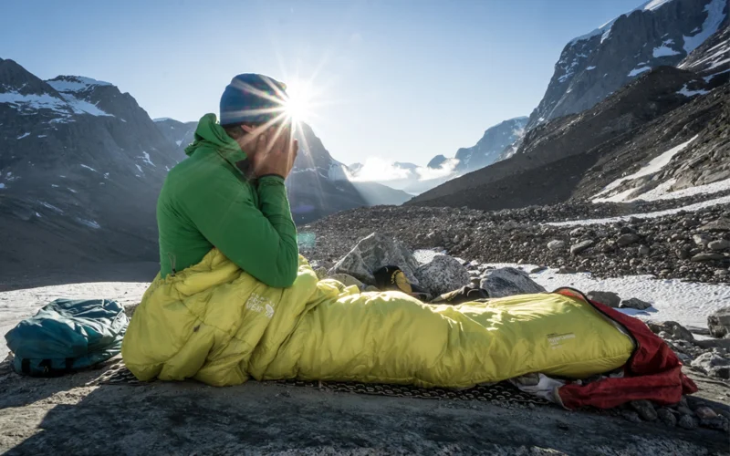 Waking up can leave you groggy but experts say that exposure to sunlight in the morning is key to helping your body adjust—as this hiker likely discovered while waking up in the Skjoldungen range of Greenland.